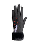 An Auclair black glove with thick black fur cuff, silver cat sitting with red collar and 4 red hearts.