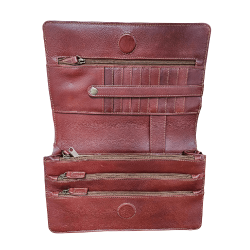 Inside Whiskey color cross body bag showing multiple compartments and card slots