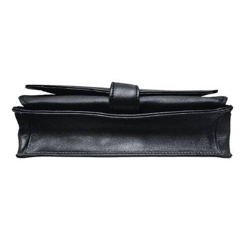 Black Derek Alexander Deluxe Clutch with sleek design, featuring a compact structure and fold-over closure. Ideal for day-to-night use.