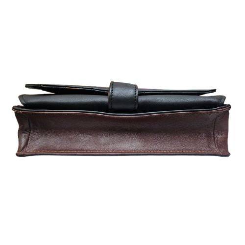 Derek Alexander Deluxe Clutch in black and brown leather with a sleek design and removable shoulder strap for versatile use.