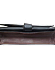 Derek Alexander Deluxe Clutch in black and brown leather with a sleek design and removable shoulder strap for versatile use.