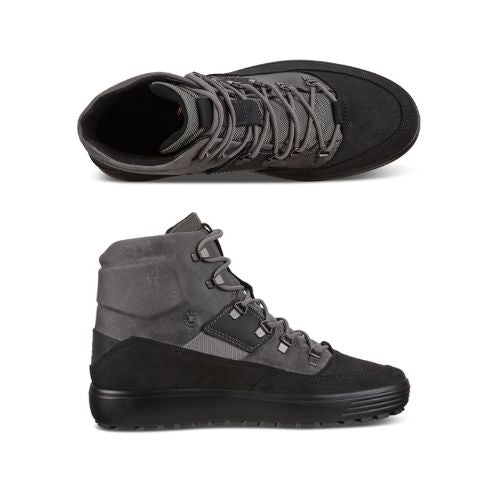 A pair of Ecco sneaker boots with two tone leather uppers, grey laces, and a black outsole. 