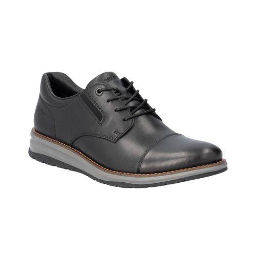 14701 Lace-Up Sneaker shown in black leather with contrast brown stitching and sole detail, styled with dark denim jeans. Features classic oxford design with clean lines, cushioned grey midsole, and durable rubber outsole for versatile casual to formal wear.