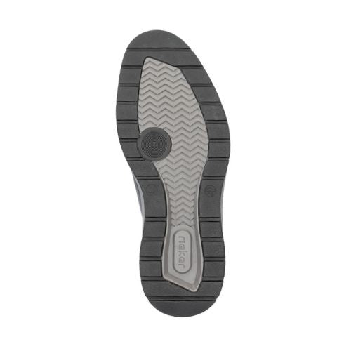 Bottom view of 14701 Lace-Up Sneaker sole featuring durable rubber outsole with chevron pattern grip, layered design, and circular traction pad for enhanced stability and slip resistance