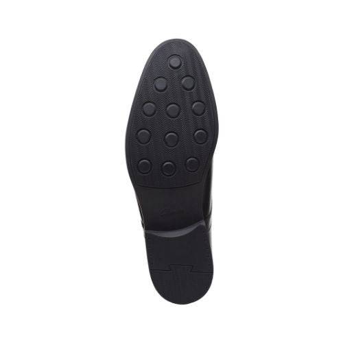 Black rubber outsole with circle tread pattern