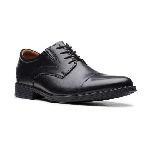 Black leather dress shoe with cap to and adjustable lace closure.