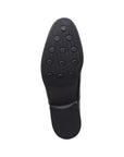 Black rubber outsole with circle tread pattern