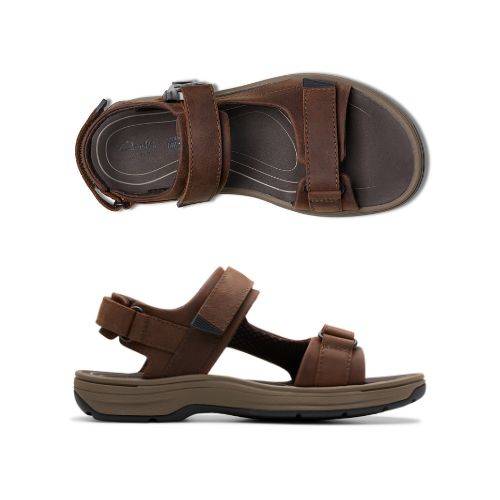 Top and profile view of Saltway Trail sandal. Footbed is brown with Clarks branding. 