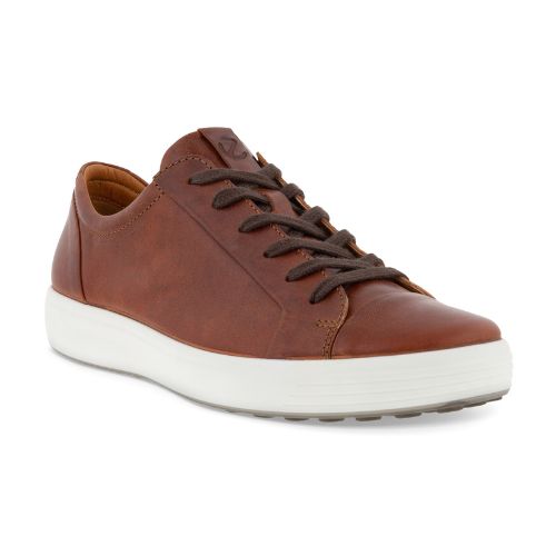 A dark brown nubuck casual sneaker with a white midsole and brown outsole. A brown leather tag near the laces show the Ecco logo. 