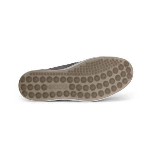 Raised circle design outsole in soft tan with Ecco logo near heel.