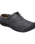 Howser III Slide Clog in Grey. A slip-on shoe with a grey textile upper, featuring an elastic bungee around the heel. Outsole is black. 