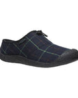 Howser III Clog in Navy. A slip-on shoe with a blue plaid textile upper, featuring an elastic bungee closure around the heel. Outsole is black. 