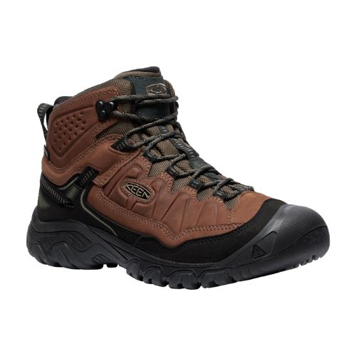 Mid-height hiker boot with brown and black nubuck upper. Laces are brown, outsole is black. 