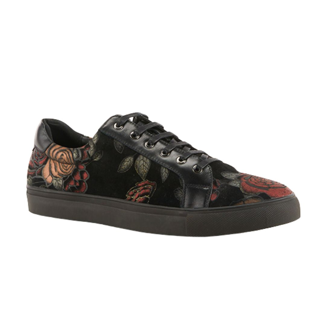 Black lace-up shoe with metallic red and green rose pattern, a black outsole, and black laces. 