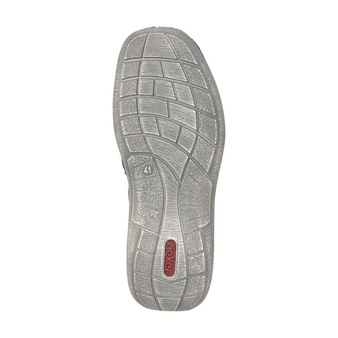 Bottom view of 03030 Slip-On Lace Sneaker showing textured rubber outsole with geometric tread pattern, featuring durable grip design and flexible construction in light gray color