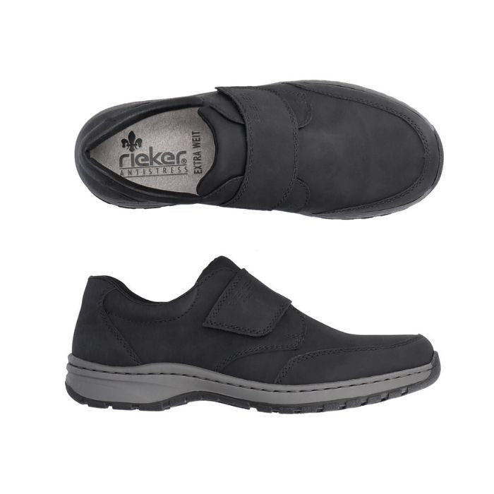 Top and side view of black shoe with Velcro closure and grey midsole. Rieker logo on heel of grey insole.