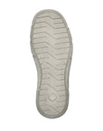 Bottom view of 04051 Slip-On Shoe showing light gray rubber outsole with zigzag traction pattern and circular brand logo, featuring durable non-slip grip design for reliable traction and stability.