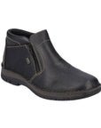 Black leather ankle boot with beige contrast stitching, outside zipper closure and brown midsole.