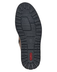 Black rubber outsole of men's boot with red Rieker logo on heel.