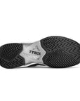 The sole of a Tyrol pickleball shoe features black herringbone tread patterns for lateral stability.