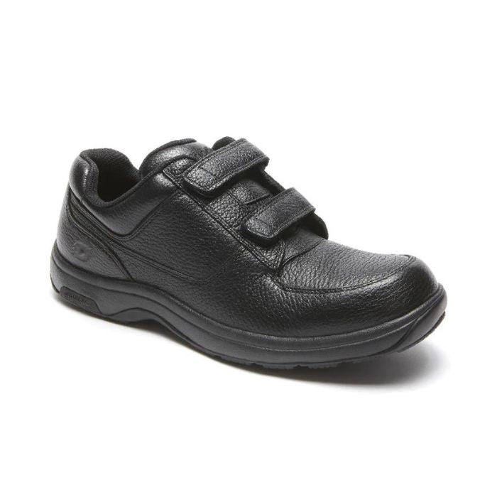 Black leather shoes with two adjustable Velcro straps and apron toe stitching. Outsole is black.