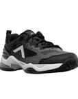 Black athletic shoe with breathable upper and textured sole for lateral stability.