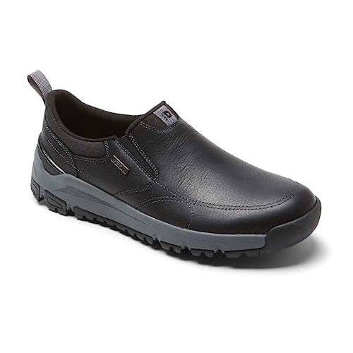 Dunham black leather slip on sneaker with grey midsole and black rubber outsole.