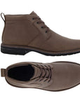 A pair of Ecco Brown leather low-heel boots with detailed stitching, brown laces, waterproof stamped at heel,  light brown stitches on mid-sole with dark brown outsole. 