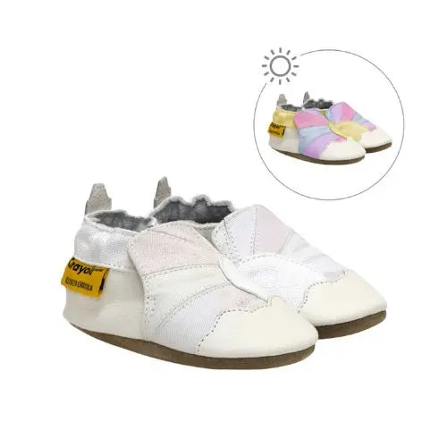 Pair of rainbow patterned kids shoes that change colour in the sun.