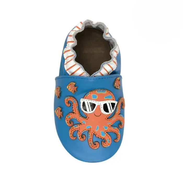 Blue leather shoes with orange octopus and fish on them.