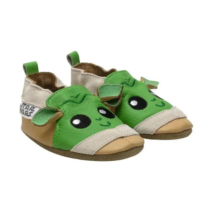 Brown and green leather baby shoes that look like Baby Yoda.