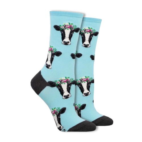 blue socks with cows wearing flower headbands