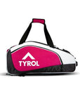 A pink TYROL sports bag with dual handles and multiple compartments.