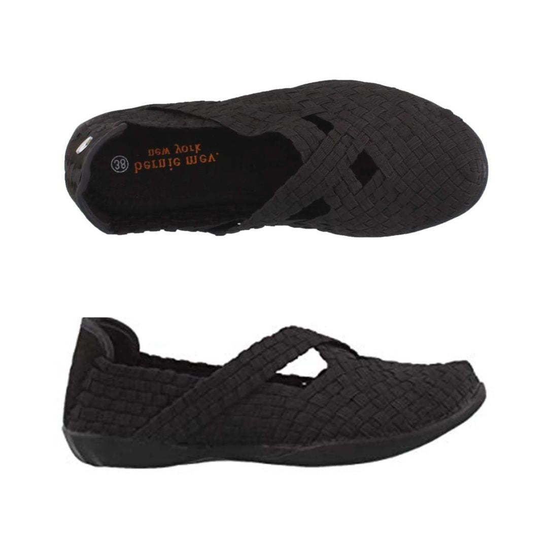 A pair of black Bernie Mev flats with a woven elastic upper that has X shaped straps across the foot, black logo'd footbed and a black outsole.