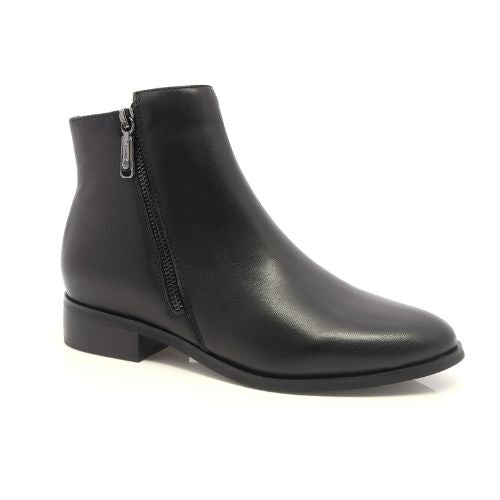 Blondo Carly leather ankle boot with a slight pointed toe, a small stacked heel, and a black outside zipper. 