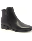 Blondo Carly leather ankle boot with a slight pointed toe, a small stacked heel, and a black outside zipper. 