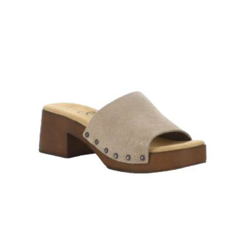 Marly slide sandal with soft grey suede leather upper and brown block heel outsole. Tan footbed with brand logo detailing. Upper is attached to outsole with six silver rivets 