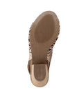 Brown outsole of Lacey sandal in taupe metallic. Textured slightly for grip. 