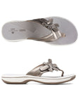 Top and profile view of Breeze Floral sandal in pewter. Clarks branding is visible on footbed. 