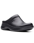 Black leather clogs with slight platform outsole and small embossed Clarks logo at the instep. 