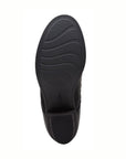 Black textuted outsole of Neva Zip bootie in black. 