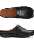 Top and profile view of UNLoop Ease in black. Footbed is brown with Clarks logo. Shoe has a round toe with seam down the center. 