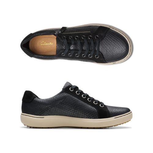 Top and profile view of Nalle sneaker in black. Clarks logo is visible on the insole. 