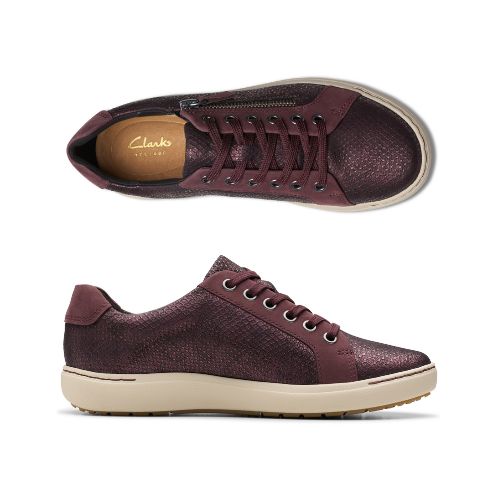 Top and profile view of Nalle sneaker in wine. Insole has Clarks logo visible. 