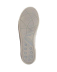 Beige rubber outsole of Acacia flat in floral.