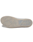 Taupe rubber outsole of Aika sneaker in white. 