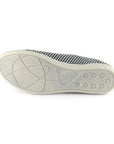 Grey rubber outsole of Aika sneaker in polka.