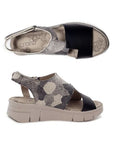 Top and side view of Isla sandal. Footbed is grey with Cloud branding. 