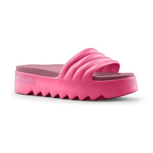 Pool Party slide sandal in Berry. A magenta 1.5 inch platform sandal with deep grooves on the outsole. 