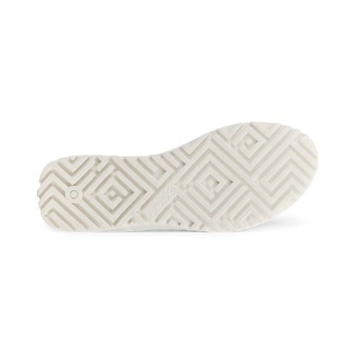 White outsole of Ecco Sneaker. Tread is done in a geometric pattern with Ecco logo in the center. 